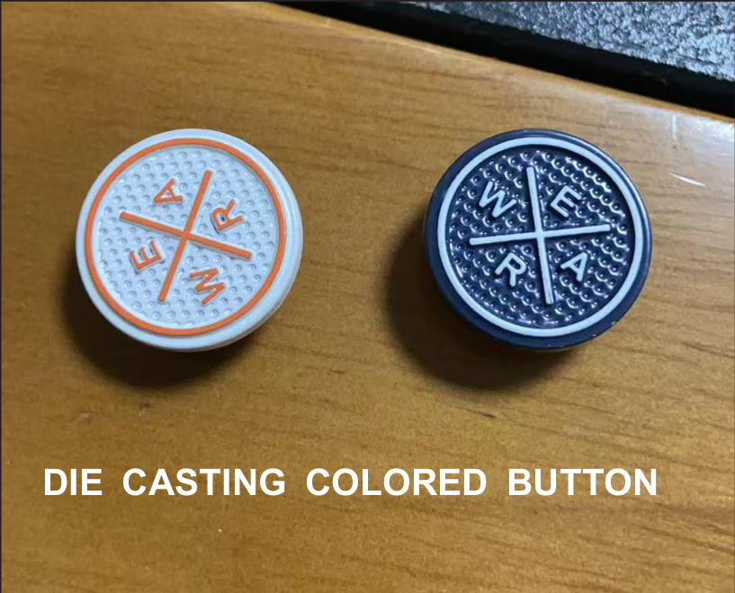Die casting buttons and rivets with laser engraved logos made in Ulhasnagar